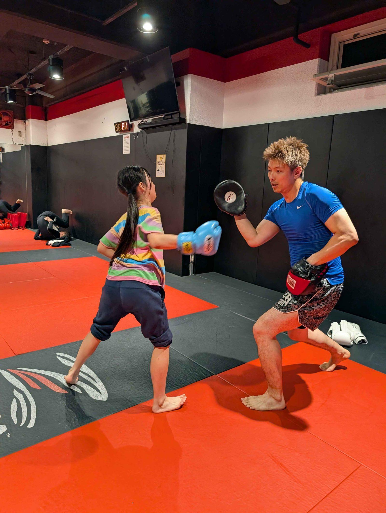 Kid throwing a punch
